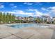 Community pool area with lounge chairs, providing a refreshing and relaxing amenity for residents at 4252 Rockdell Hall St, Raleigh, NC 27616