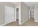 Hallway leads to a bathroom and other rooms at 4252 Rockdell Hall St, Raleigh, NC 27616