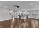 Open floor plan showcasing the living room, kitchen, and hardwood floors at 4252 Rockdell Hall St, Raleigh, NC 27616