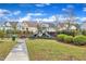 Neighborhood playground with slides, a picnic table, and green space, perfect for outdoor activities at 4252 Rockdell Hall St, Raleigh, NC 27616