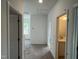 Hallway view with access to bedroom, bathroom and stairway, offering an open, airy feel at 4404 Darius Ct # 41, Fuquay Varina, NC 27526