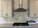 Kitchen with gray cabinets, subway tile backsplash, stainless steel appliances, and quartz countertops at 4404 Darius Ct # 41, Fuquay Varina, NC 27526