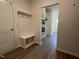 Mudroom with built in bench and cabinets provides a convenient entry point to the home at 4404 Darius Ct # 41, Fuquay Varina, NC 27526
