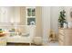 A charming Bedroom with a white crib, decorative rug and rocking horse at 472 Carolina Springs Blvd, Apex, NC 27539