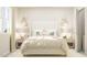 A neutral, well-lit bedroom with decoratively adorned bedside tables at 472 Carolina Springs Blvd, Apex, NC 27539
