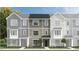 Charming townhouse complex with inviting curb appeal and diverse color schemes at 472 Carolina Springs Blvd, Apex, NC 27539