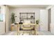 Bright home office with light wood desk and shelves and neutral accents and rug, showcasing a serene workspace at 472 Carolina Springs Blvd, Apex, NC 27539