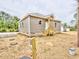 Newly built house with fresh vinyl siding and a wood staircase at 48 S Grace Way, Henderson, NC 27537