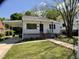 Well-maintained one-story home featuring an attached carport, landscaped front yard, and welcoming entrance at 509 Coleman St, Raleigh, NC 27610