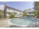 A large kidney-shaped pool is surrounded by a concrete pool deck at 5301 Night Heron Dr, Wake Forest, NC 27587