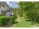 Spacious backyard featuring well-maintained lawn at 5318 Crescentview Pkwy, Raleigh, NC 27606