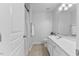 Bright bathroom with a white vanity, neutral tile floor, and shower at 5318 Crescentview Pkwy, Raleigh, NC 27606