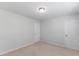 Cozy bedroom with neutral walls, carpet, and ample natural light from multiple windows at 5318 Crescentview Pkwy, Raleigh, NC 27606
