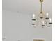 Close-up of an ornate chandelier hanging in a room at 5318 Crescentview Pkwy, Raleigh, NC 27606