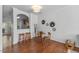 Cozy dining area with decorative wall art, seamlessly connected to the kitchen at 5318 Crescentview Pkwy, Raleigh, NC 27606