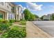 Neighborhood street with manicured lawns and sidewalks at 5318 Crescentview Pkwy, Raleigh, NC 27606