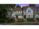 Charming townhome with a well-manicured lawn and inviting curb appeal at 5318 Crescentview Pkwy, Raleigh, NC 27606