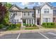 Charming townhome with a well-manicured lawn and inviting curb appeal at 5318 Crescentview Pkwy, Raleigh, NC 27606