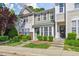 Charming townhome with a well-manicured lawn and inviting curb appeal at 5318 Crescentview Pkwy, Raleigh, NC 27606
