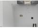 Unfinished laundry room space with washer and dryer hookups and shelving for storage at 5318 Crescentview Pkwy, Raleigh, NC 27606