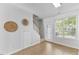 Spacious living room with neutral walls, staircase, and sliding glass door at 5318 Crescentview Pkwy, Raleigh, NC 27606