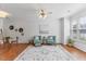 Inviting living area with a ceiling fan and comfortable seating at 5318 Crescentview Pkwy, Raleigh, NC 27606