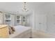 Spacious main bedroom with natural light, carpet, neutral walls and large closet at 5318 Crescentview Pkwy, Raleigh, NC 27606