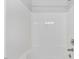 Clean white shower with a handheld shower head at 5318 Crescentview Pkwy, Raleigh, NC 27606