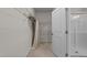 Walk-in closet with wire shelving and access to an adjacent shower area at 5518 Jessip St, Morrisville, NC 27560