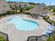 Inviting community pool surrounded by lounge chairs and a shaded pavilion at 5518 Jessip St, Morrisville, NC 27560