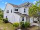 Two-story home with white siding, dark shutters, and well-maintained landscaping at 5518 Jessip St, Morrisville, NC 27560