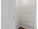 White pantry with wire shelving that provides ample storage space for food and household goods at 5518 Jessip St, Morrisville, NC 27560