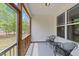 Relaxing porch area with outdoor seating and a view of the surrounding landscape at 5518 Jessip St, Morrisville, NC 27560