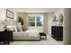 An inviting bedroom has a comfy bed and dresser for storage and style at 617 Cassa Clubhouse Way, Knightdale, NC 27545