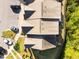 Aerial view showcasing townhome community with lush landscaping, ample parking, and well-maintained surroundings at 6230 Pesta Ct, Raleigh, NC 27612