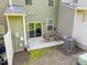 Backyard with concrete patio, outdoor seating, and a sliding glass door offering a relaxing space at 6230 Pesta Ct, Raleigh, NC 27612
