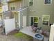 Cozy patio with outdoor seating, sliding door access, and a privacy fence creating an inviting backyard space at 6230 Pesta Ct, Raleigh, NC 27612