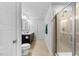 Modern bathroom with a double sink vanity and frameless glass shower at 6230 Pesta Ct, Raleigh, NC 27612