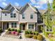 Attractive exterior of a modern townhome showcasing well-maintained landscaping and a welcoming entryway at 6230 Pesta Ct, Raleigh, NC 27612
