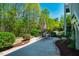 Backyard patio area perfect for outdoor entertaining and relaxing with lots of trees for shade at 658 Bennett Mountain Trce, Chapel Hill, NC 27516