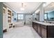 Spacious bathroom featuring tiled floors, double vanities, soaking tub and glass shower at 658 Bennett Mountain Trce, Chapel Hill, NC 27516