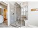 Bathroom with glass-enclosed shower, tiled walls, and built-in bench seating at 658 Bennett Mountain Trce, Chapel Hill, NC 27516