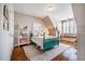 Bright bedroom with a large bed, shelves, a window seat, and natural light at 658 Bennett Mountain Trce, Chapel Hill, NC 27516