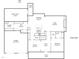 Layout showcasing a first-floor plan with a kitchen, living room, dining area, garage, and outdoor deck and patio at 658 Bennett Mountain Trce, Chapel Hill, NC 27516