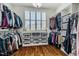 Spacious walk-in closet with ample storage, shelves, and natural light from a window at 658 Bennett Mountain Trce, Chapel Hill, NC 27516