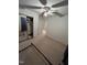 Standard bedroom with closet, ceiling fan, and neutral carpet at 683 Osgood Rd, Sanford, NC 27330
