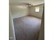 Bedroom featuring neutral colored carpet and a window for natural light at 683 Osgood Rd, Sanford, NC 27330