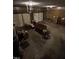 Garage with storage space, lighting, and visible garage door mechanisms at 683 Osgood Rd, Sanford, NC 27330