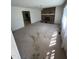 Bright living room with a brick fireplace and lots of natural light streaming in from a window at 683 Osgood Rd, Sanford, NC 27330