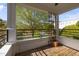 Lovely balcony with wood flooring, metal railing, and great view of the outside scenery at 703 Copperline Dr # 301, Chapel Hill, NC 27516
